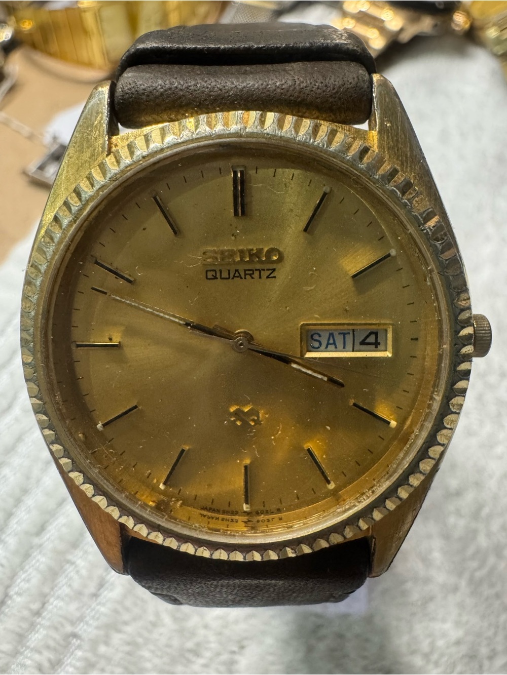 Seiko sq Gold Dial Watch with Brown Strap